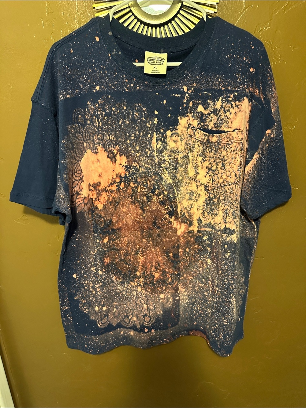 Navy women’s Short-Sleeve Tee with Peach Splatter swimming or space look